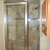 We took an unfunctional, poorly designed Littleton basement bathroom, relocated soffits, heat runs, plumbing, and remodeled it to create a spa type bathroom that includes this steam shower.

